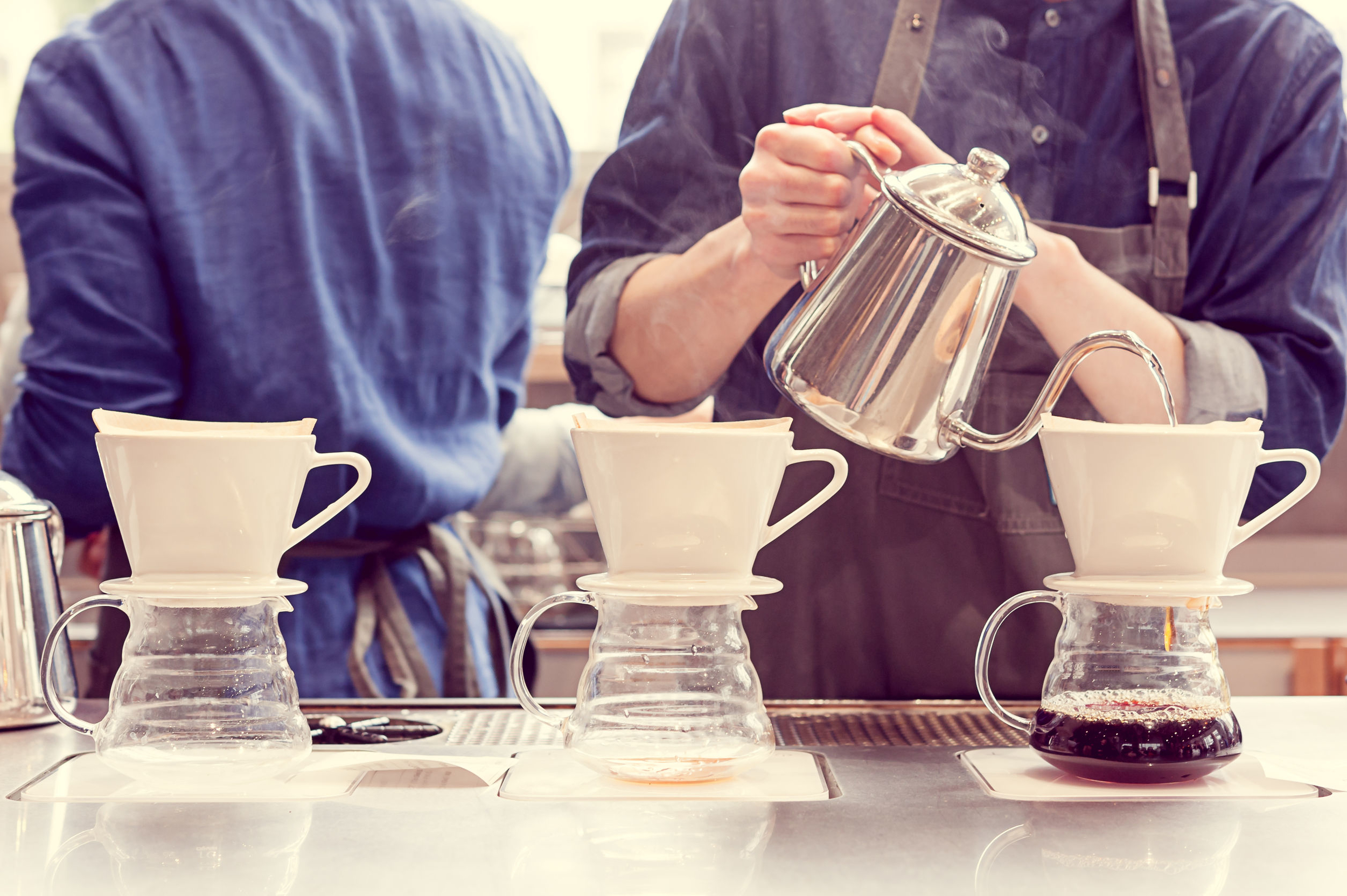 39316804 - barista driping coffee